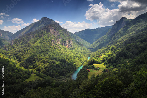 small village at the foot of the mountains © smolskyevgeny