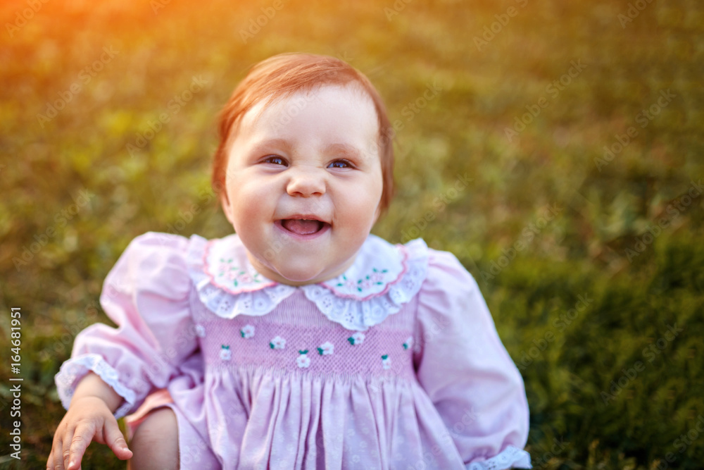 Sweet Beautiful little girl outdoors looking to the camera. Joyful, Happy, Excited. Closeup Portrait Sweet Beautiful little girl outdoors looking to the camera. Joyful, Happy, Excited. Closeup Portrait