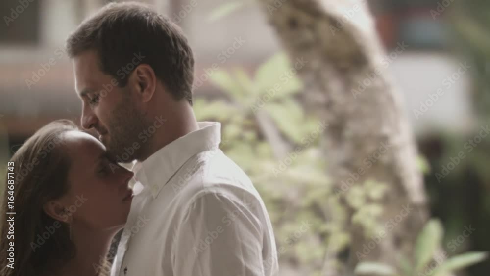 Trembling and gentle embrace of the couple in love Trembling and gentle embrace of the couple in love