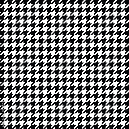 Black and white houndstooth pattern vector. Classical checkered textile design.