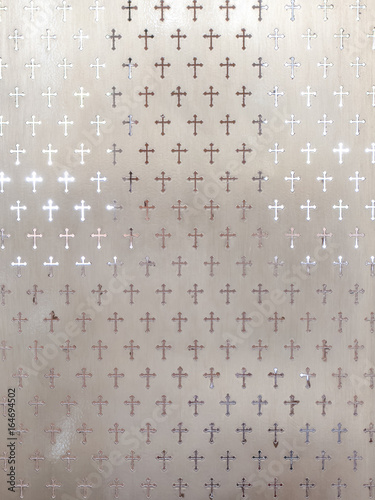 the cross pattern on frosted glass texture with soft light from background