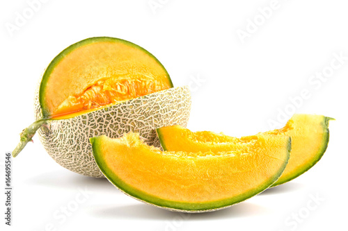 Slices of fresh organic melon isolated on white background , orange color inside