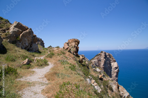 Naturalistic Trail Calavà, spring, on the horizon the Filicudi Island photo