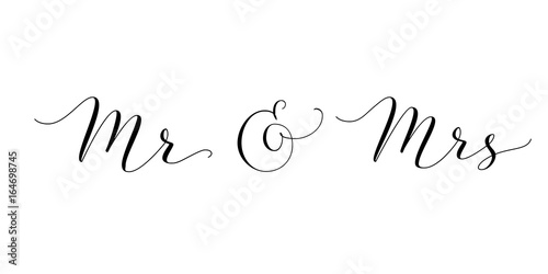 Mr and Mrs words with ampersand. Mister and Missis hand written custom calligraphy isolated on white. photo