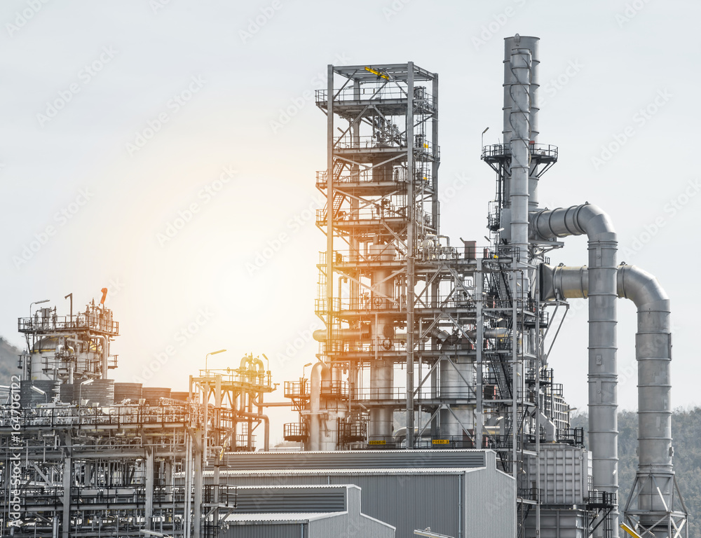 Industrial zone,The equipment of oil refining,Close-up of industrial pipelines of an oil-refinery plant,Detail of oil pipeline with valves in large oil refinery.