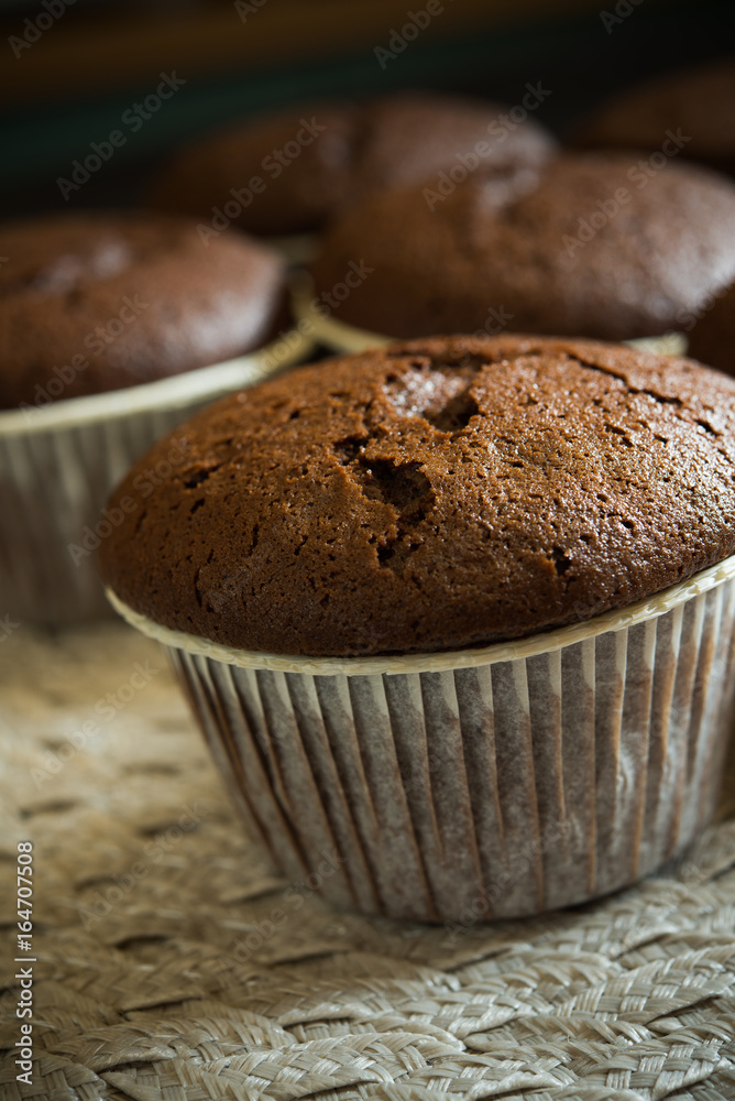 Chocolate muffin on black background Chocolate muffin on black background