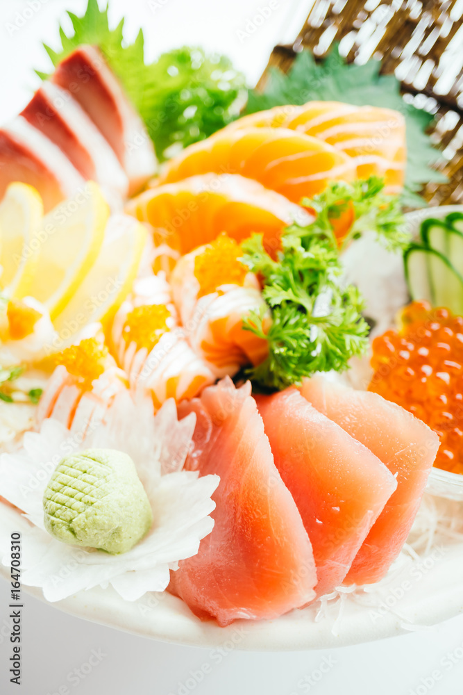Raw and fresh mixed sashimi with salmon , tuna , hamaji and other Raw and fresh mixed sashimi with salmon , tuna , hamaji and other