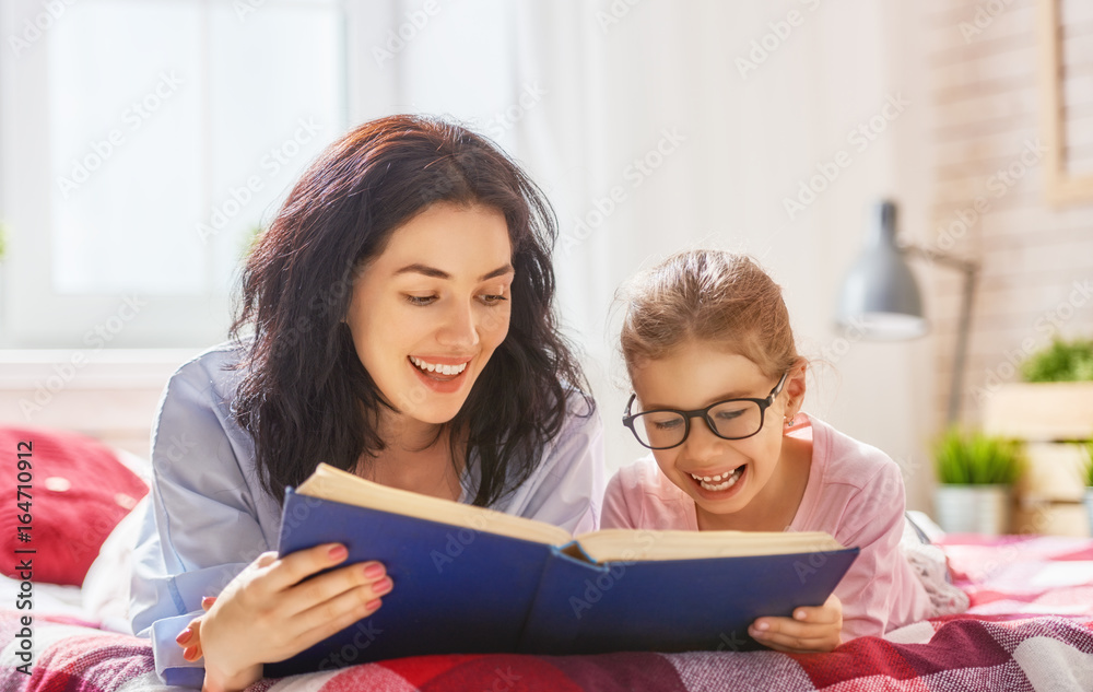 mother reading a book mother reading a book