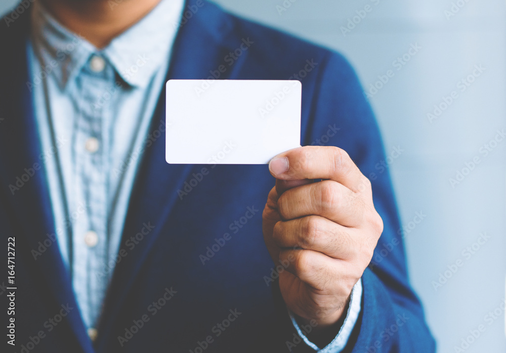 Man holding white business card,Man wearing blue shirt and showing blank white business card. Blurred background. Horizontal mockup, Smart asian business Person Professional Occupation cheerful Man holding white business card,Man wearing blue shirt and showing blank white business card. Blurred background. Horizontal mockup, Smart asian business Person Professional Occupation cheerful