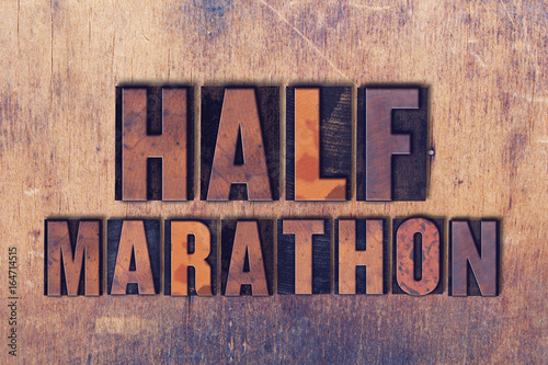 Half Marathon Theme Letterpress Word on Wood Background