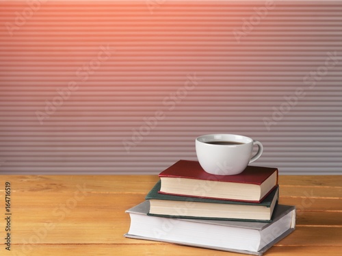 Cup and book.