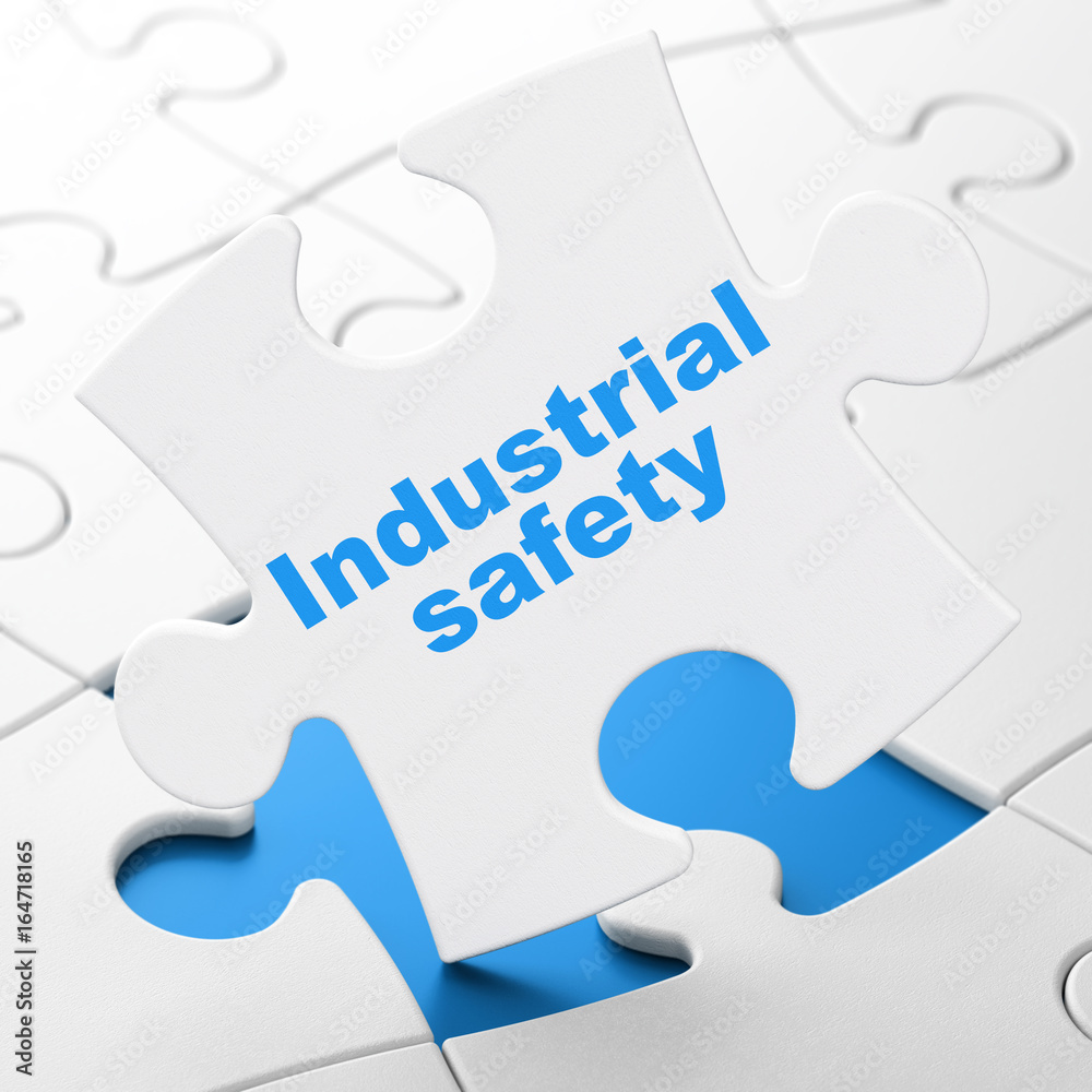 Building construction concept: Industrial Safety on puzzle background