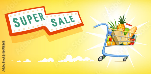Shopping cart with foodstuff. Supermarket equipment for buying