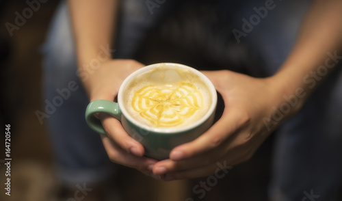 woman hand holding coffee