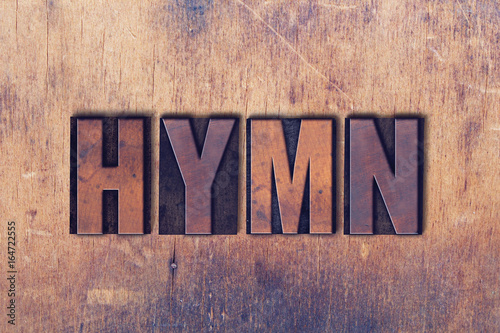 Hymn Theme Letterpress Word on Wood Background photo