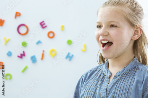 Girl in speech therapy office