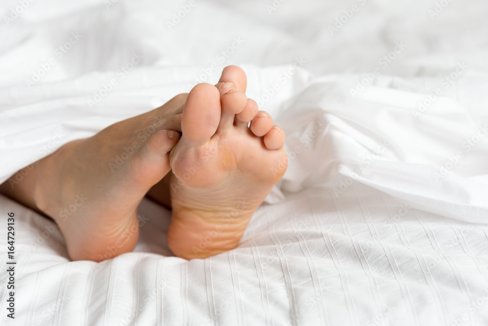 perfect and beautiful woman legs on bed perfect and beautiful woman legs on bed