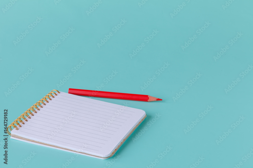 Blank writing pad for ideas and inspiration on colored background Blank writing pad for ideas and inspiration on colored background