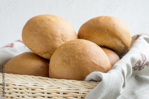 Buns in a basket with drapery