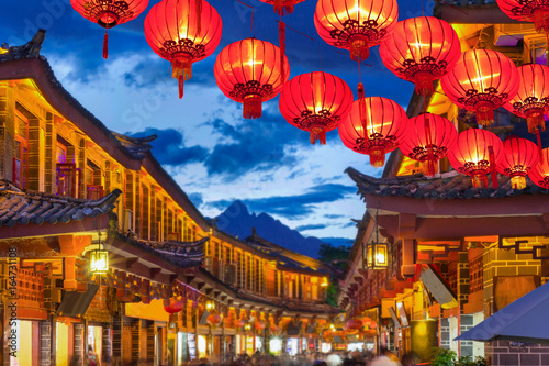Lijiang old town in the evening with crowed tourist. © toa555