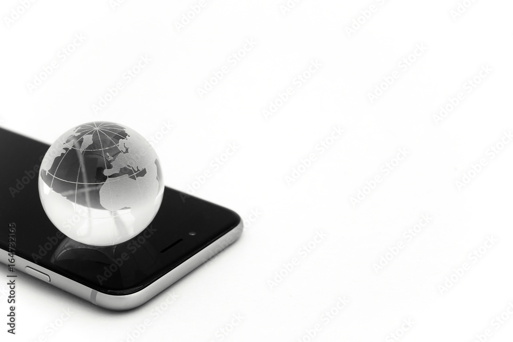 business concept of glass globe, smart phone business concept of glass globe, smart phone