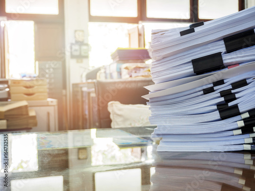 Close up of business documents stack on desk , report papers stack © skarie