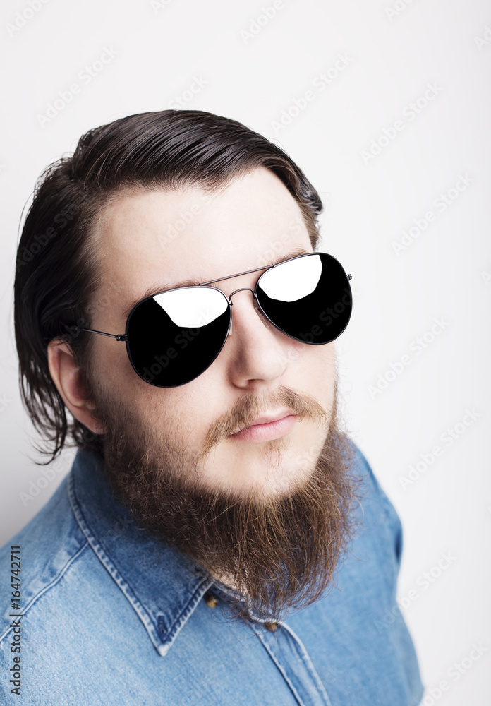 Studio portrait of caucasian young man standing up on white background Studio portrait of caucasian young man standing up on white background
