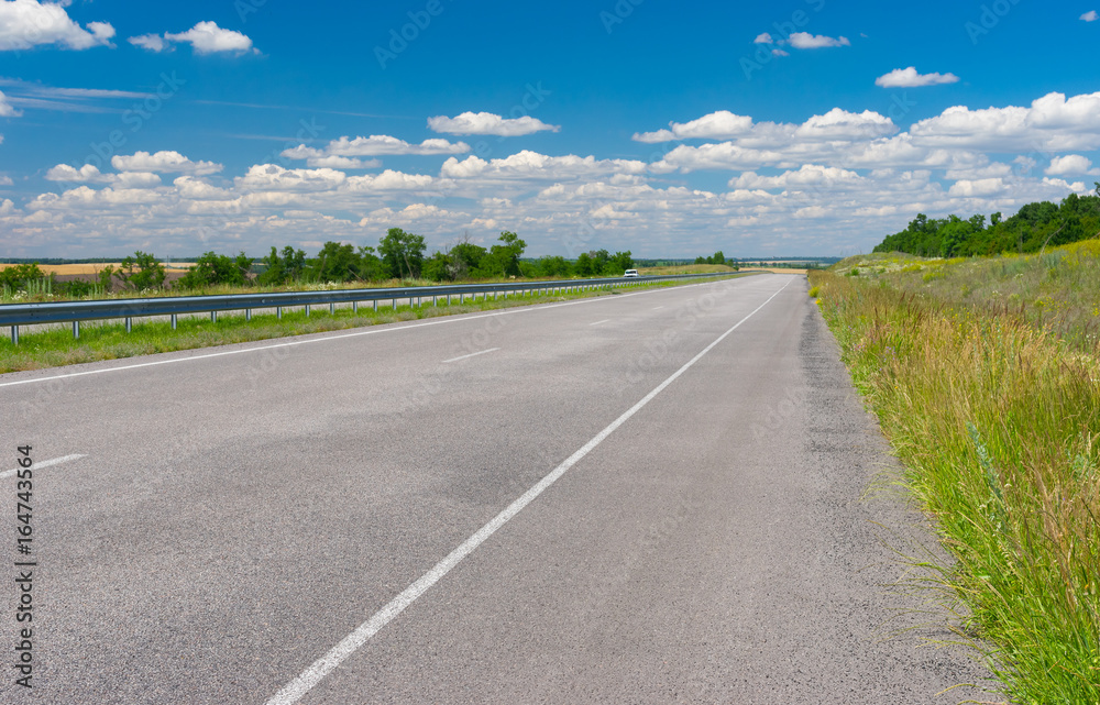 Summer landscape with new highway near Dnepropetrovsk city, Ukraine Summer landscape with new highway near Dnepropetrovsk city, Ukraine