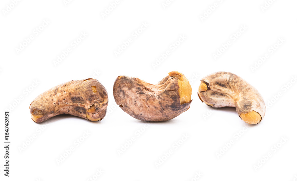Roasted cashew nuts isolated on white background Roasted cashew nuts isolated on white background