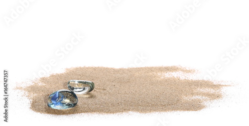 pile desert sand and glass pebble isolated on white background