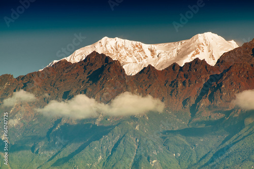 Beautiful first light from sunrise on Mount Kanchenjugha, Sikkim, India photo