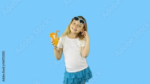 Young girl in white t-shirts flirt and drink orange juice from glass. Happy girl drink orange cocktail through straw. Clip with Premultiplied matted Alpha Channel. Transparent BG PNG.