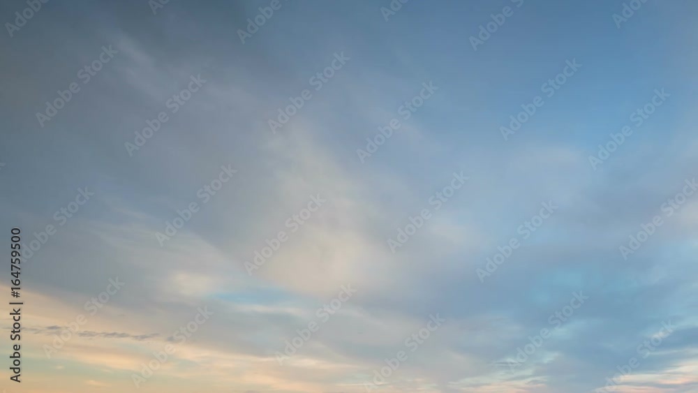 Russia, time lapse. Formation and rapid movement of white clouds of different shapes in the blue sky in late spring at sunset. Russia, time lapse. Formation and rapid movement of white clouds of different shapes in the blue sky in late spring at sunset.
