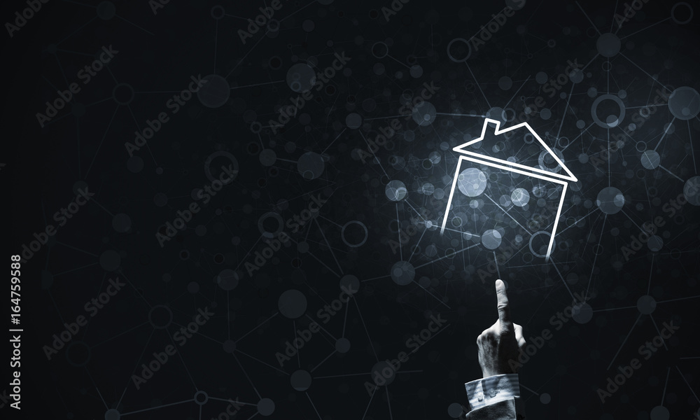 Conceptual image with hand pointing at house or main page icon o Conceptual image with hand pointing at house or main page icon o