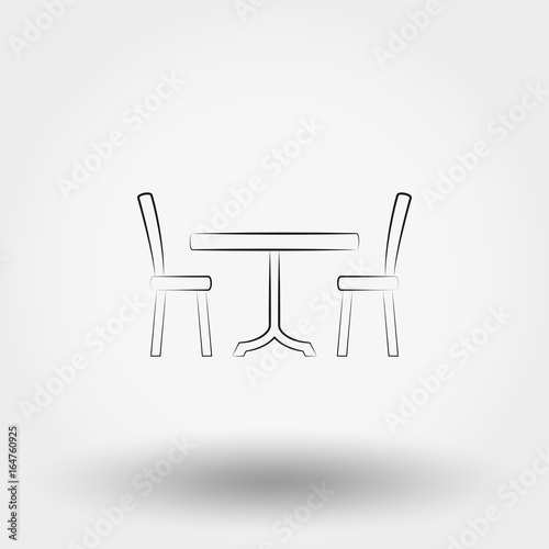 Dining table with chairs.