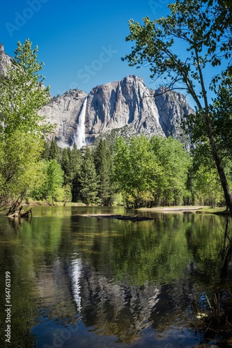 Yosemite Falls reflected in the Merced River in Yellowstone National Park in California U.S.A.