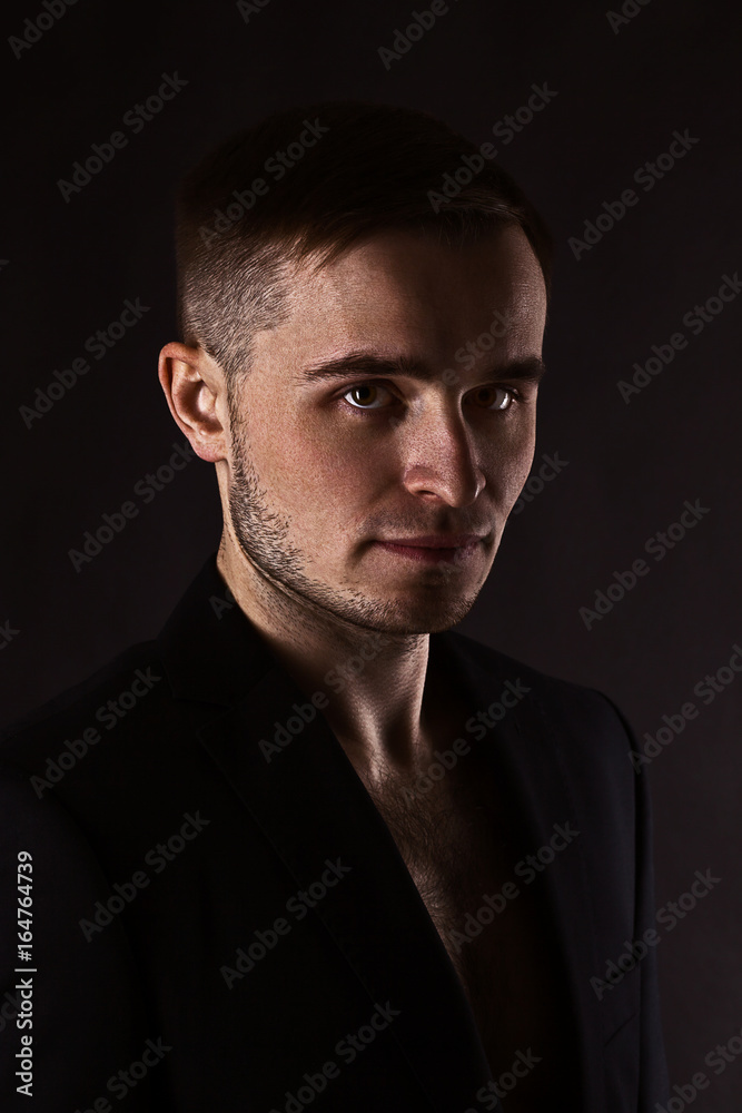 Stylish, handsome portrait of a young man