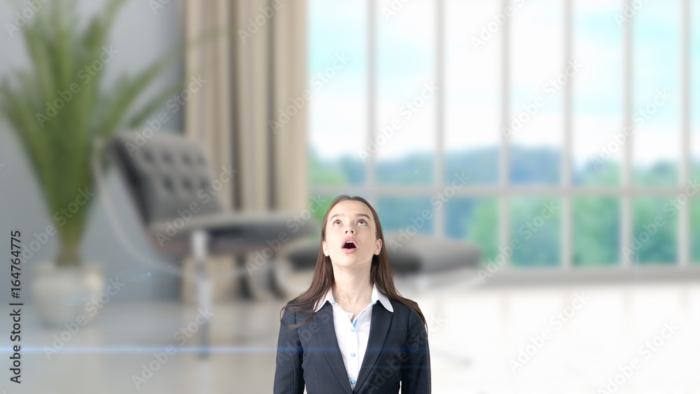 Young beautiful business woman and creative designer standing over blured interior background Young beautiful business woman and creative designer standing over blured interior background