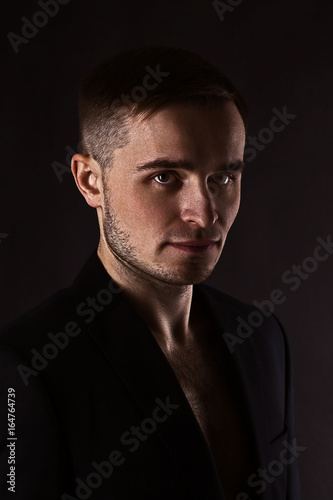 Stylish, handsome portrait of a young man