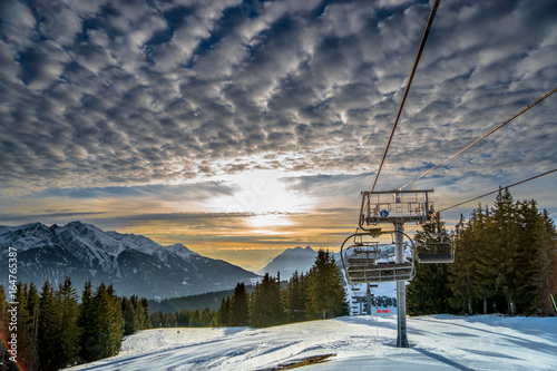 sunset ski lift photo