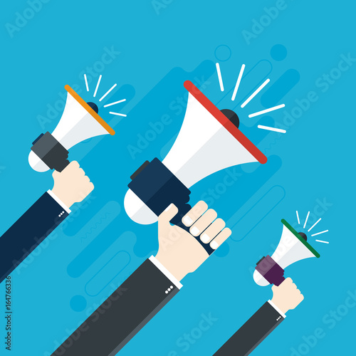  Hands holding a megaphones.