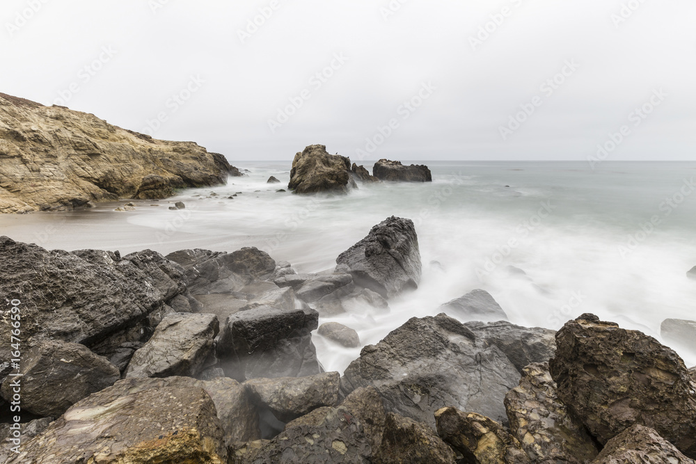 Rocky Leo Carrillo State Beach with motion blur water in Malibu, California. Rocky Leo Carrillo State Beach with motion blur water in Malibu, California.