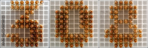 Принти на полотні 308 caliber sign composed with rifle rounds on ammo trays
