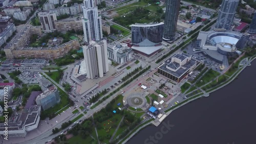 An aerial view of downtown Moscow looking over River Moscow. Top view of mid town in Moscow. Russian city skyline aerial view in the afternoon with the lights over blue hour