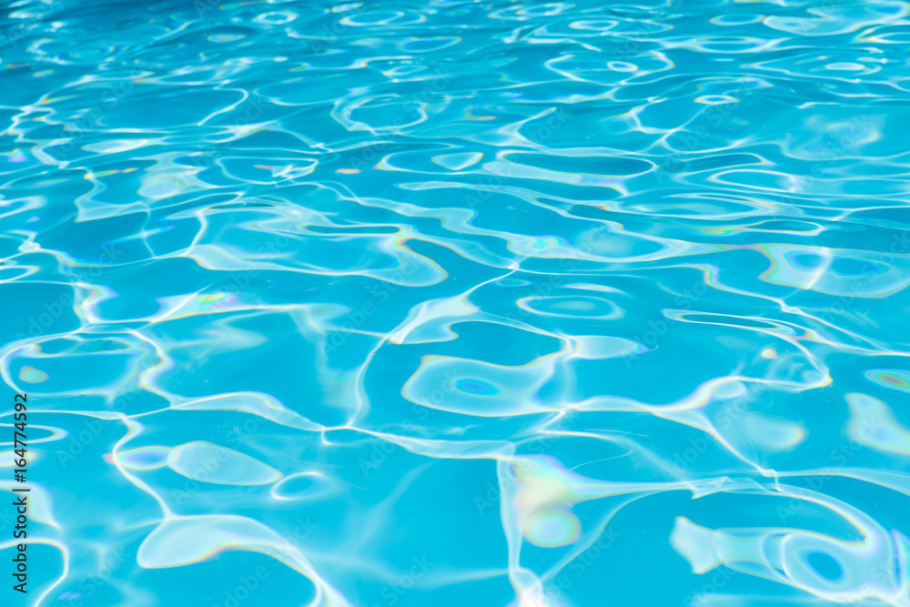 Blue and bright water surface and ripple wave in swimming pool Blue and bright water surface and ripple wave in swimming pool