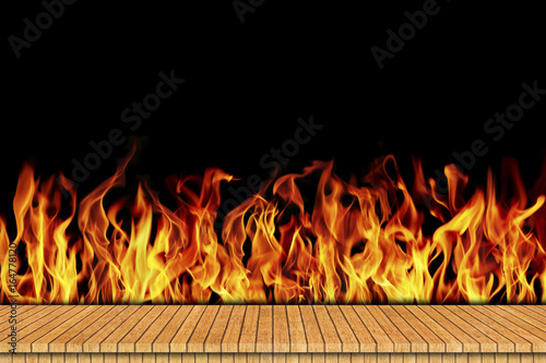 wooden floor with burning fire background for design