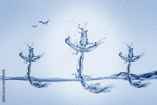 Three crosses made of water with flying birds.