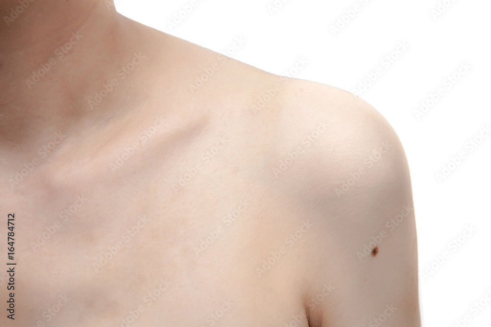 Woman's shoulder on white background isolated