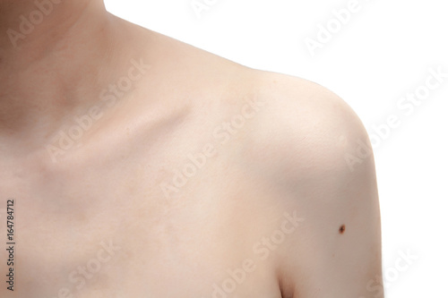 Woman's shoulder on white background isolated