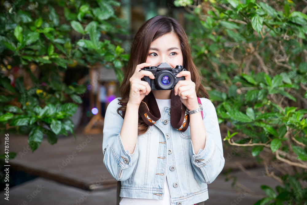 Young asian lady travel in city center Young asian lady travel in city center